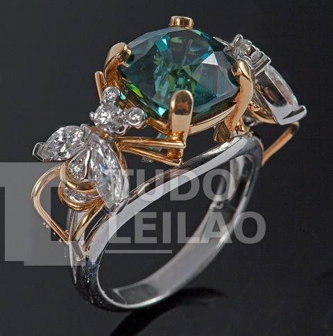 SCHLUMBERGER by TIFFANY & Co. Lindo anel em ouro branco e amarelo 18k, com turmalina azul esverdeada de lapidação cuchion facetada com 4,74 ...